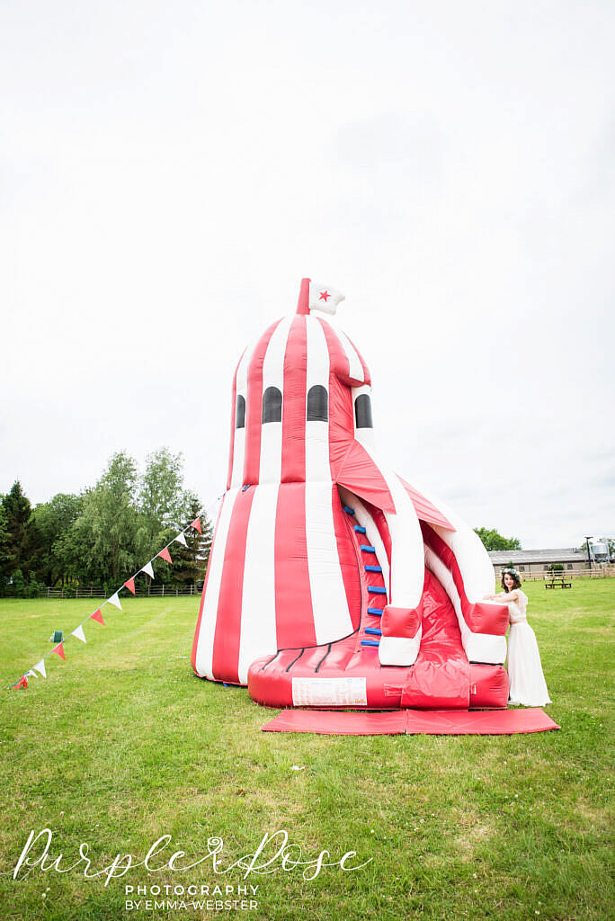 Red and white striped bouncy castle