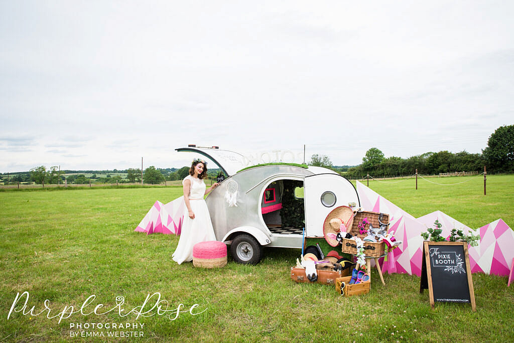 Bride with a photo booth camper van