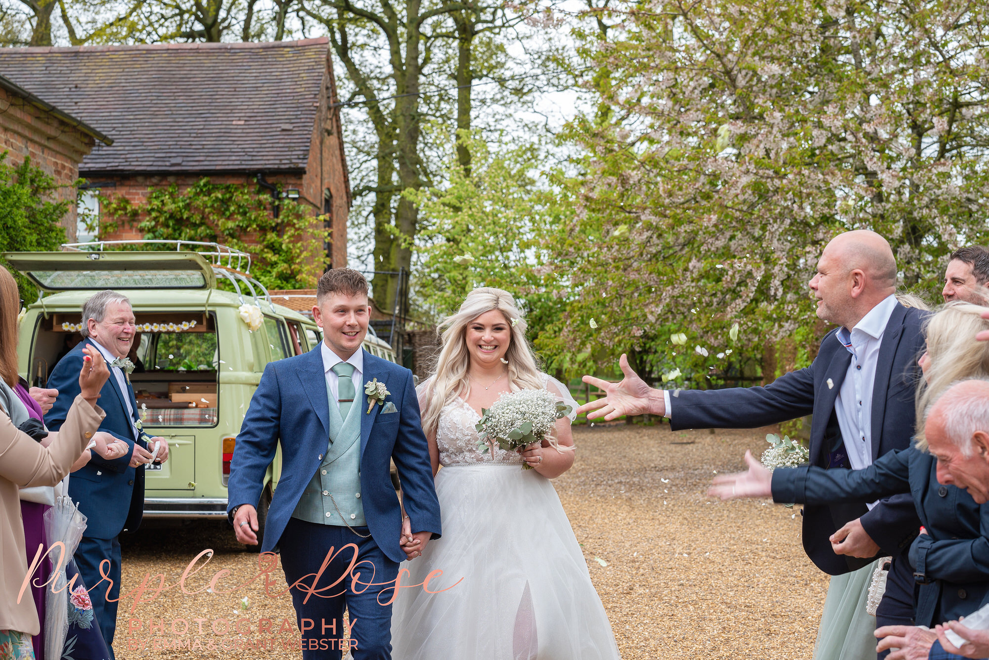 Photogoraph of a ride and groom walking on their wedding day at Park Farm Daventry, Northampton