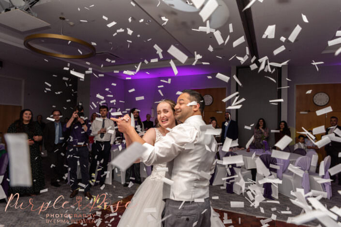 Bride and grooms 1st dance with confetti canon