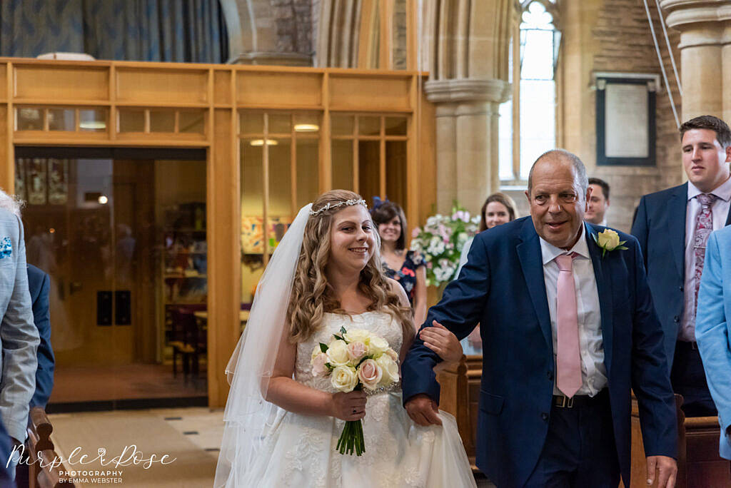 bride walking to her groom