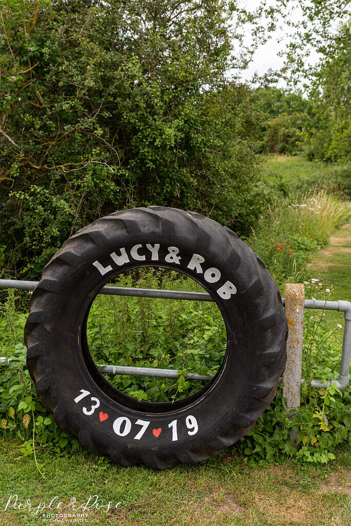 Tractor tyre painted with couples name and wedding date