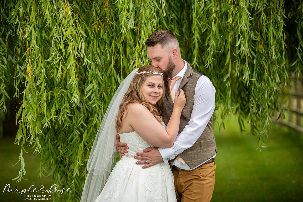 Couple surrounded by greenery