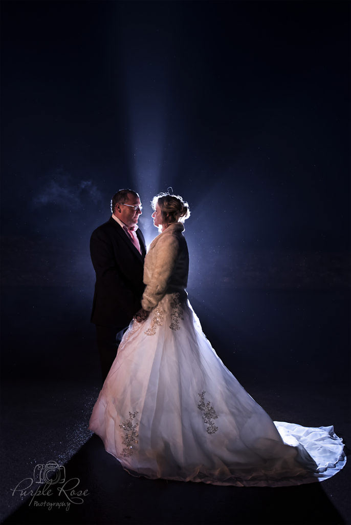 Night time photo of a bride and groom