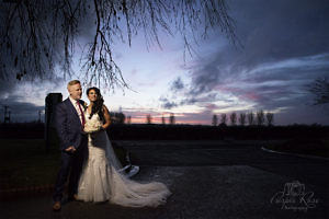 Photograph of the Bride and Groom enjoying the sunset at the Holiday Inn Newport Pagnell