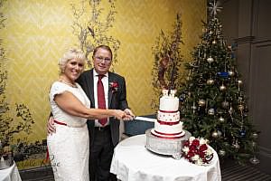 Bride & Groom cutting their cake