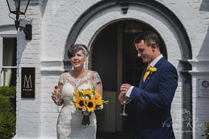 Bride and groom enjoying a drink