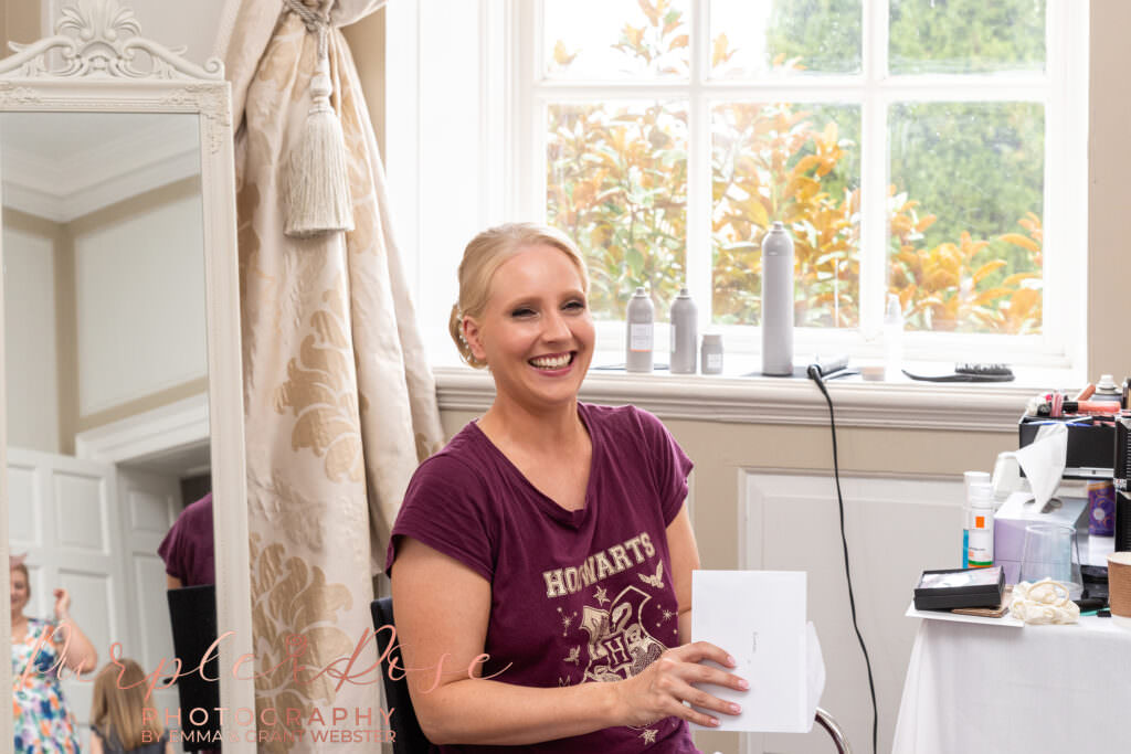 Photograph of bride getting ready on her wedding day  in Milton Keynes