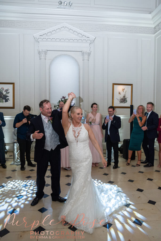 Bride and groom dancing at their wedding in Milton Keynes