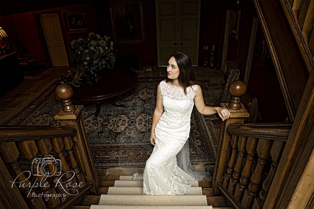 Bride walking up a staircase