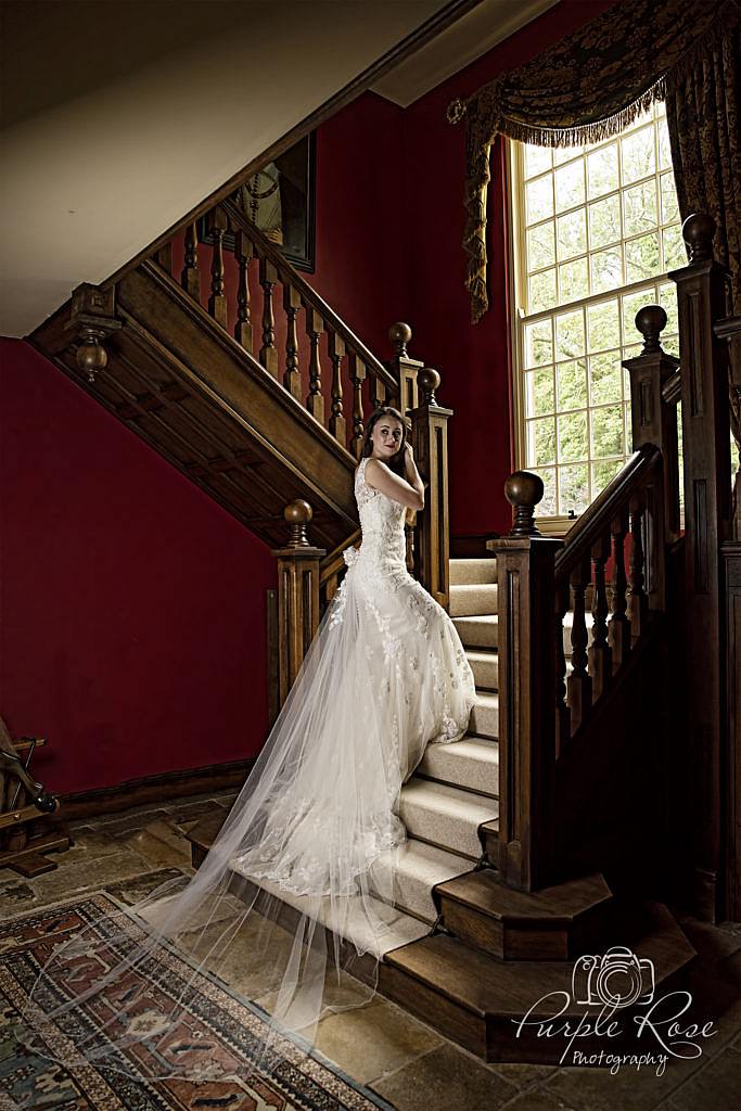 Bride standing on staircase