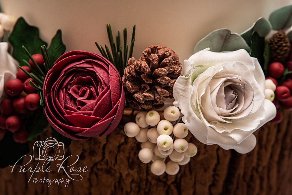 Details of a Christmas themed wedding cake