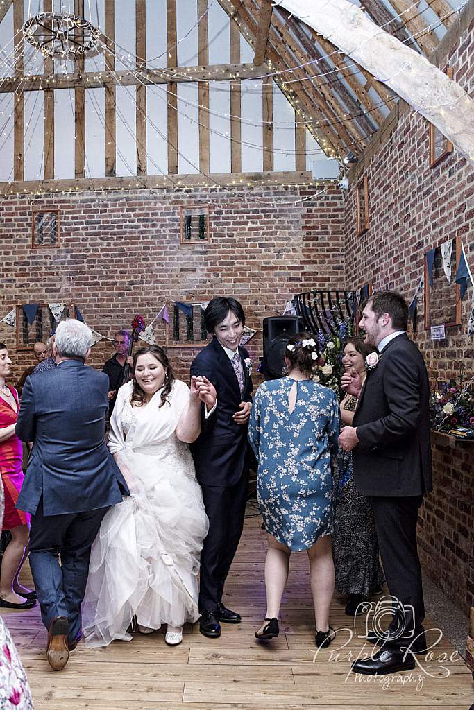 Bride and groom country dancing at their wedding