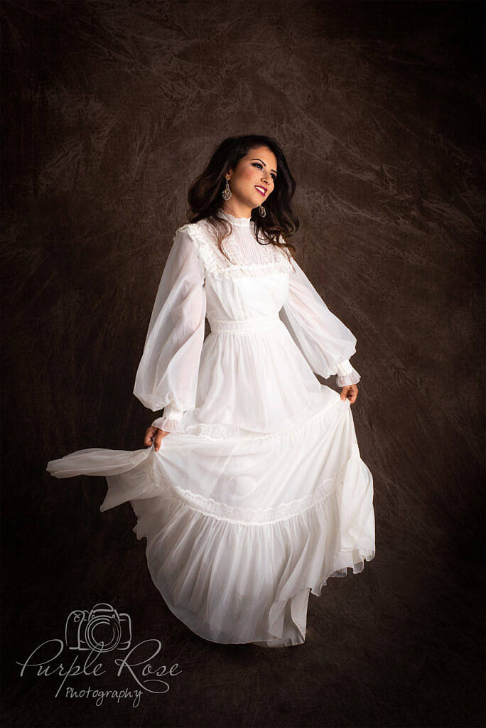 bride dancing in vintage wedding dress