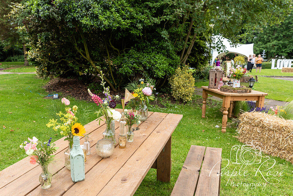 Wooden table with floral display