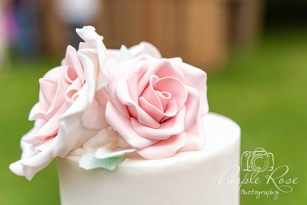 Intricate pink floral cake topper
