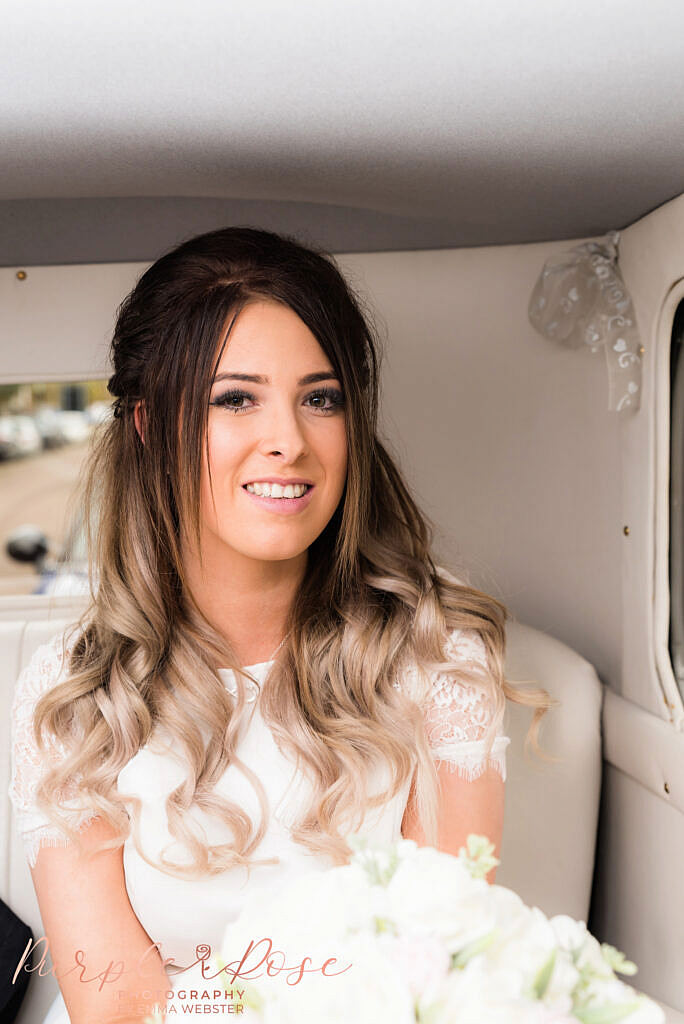 Bride waiting in her car for the ceremony