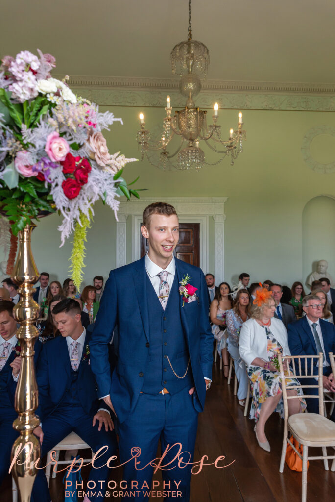 Photo of groom waiting for his bride to arrive for their wedding ceremony in Milton Keynes