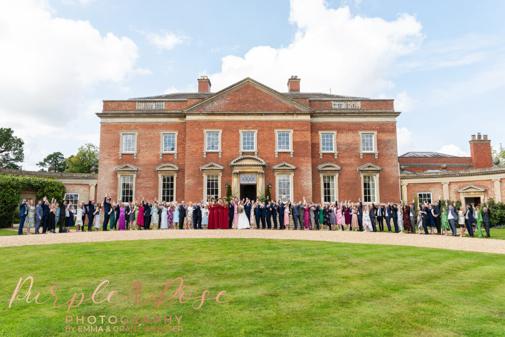 Group photo of everyone at a wedding in Milton Keynes