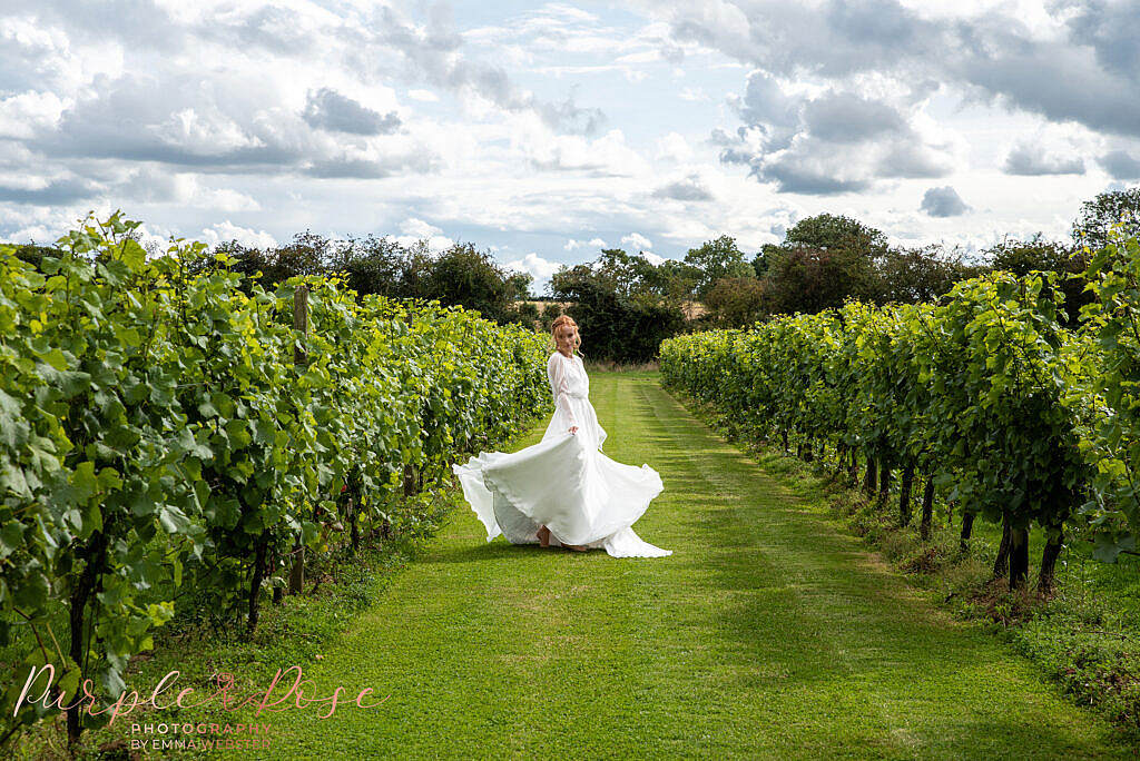 Bride twirling her dress