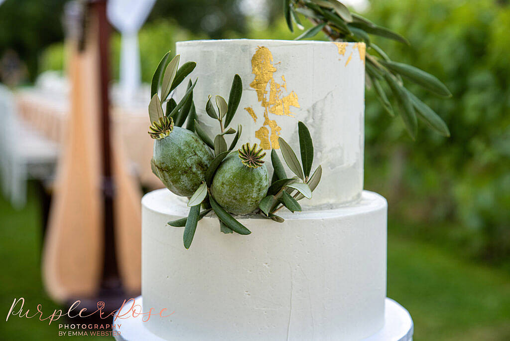 Wedding cake decorated with foliage