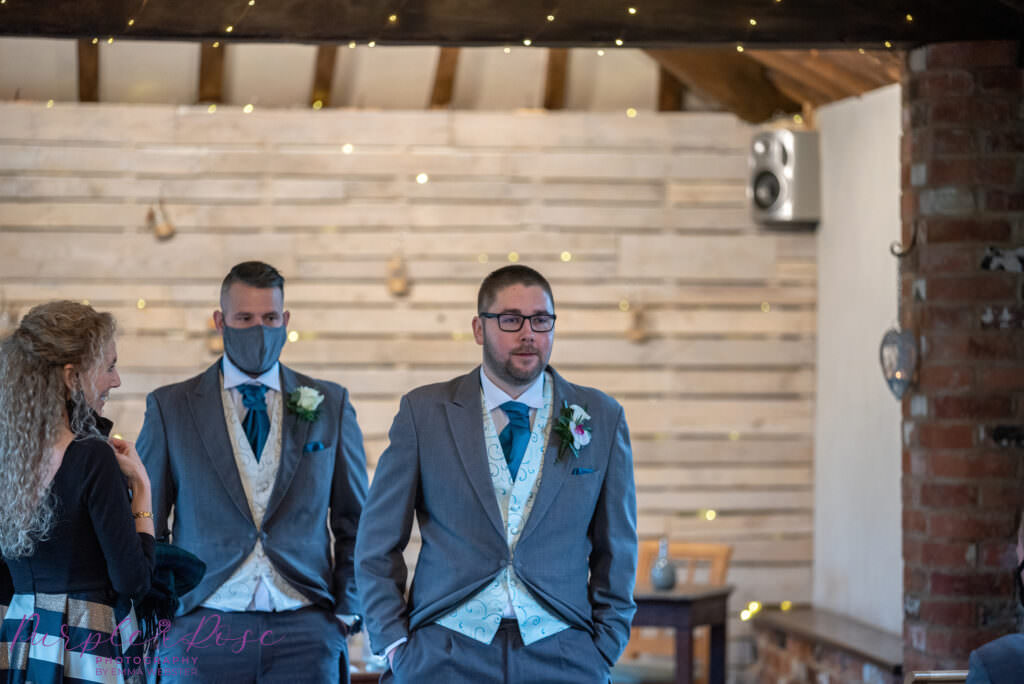 Groom and best man waiting for the bride to arrive