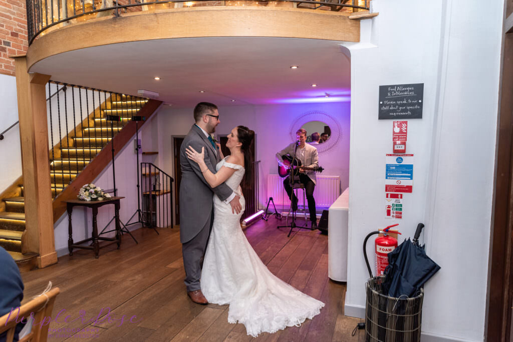 Bride and groom enjoying their 1st dance