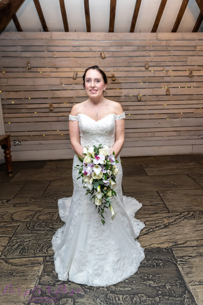 Bride holding her wedding bouquet