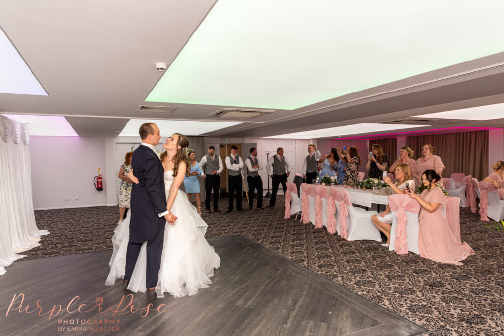 Bride and groom enjoying their 1st dance