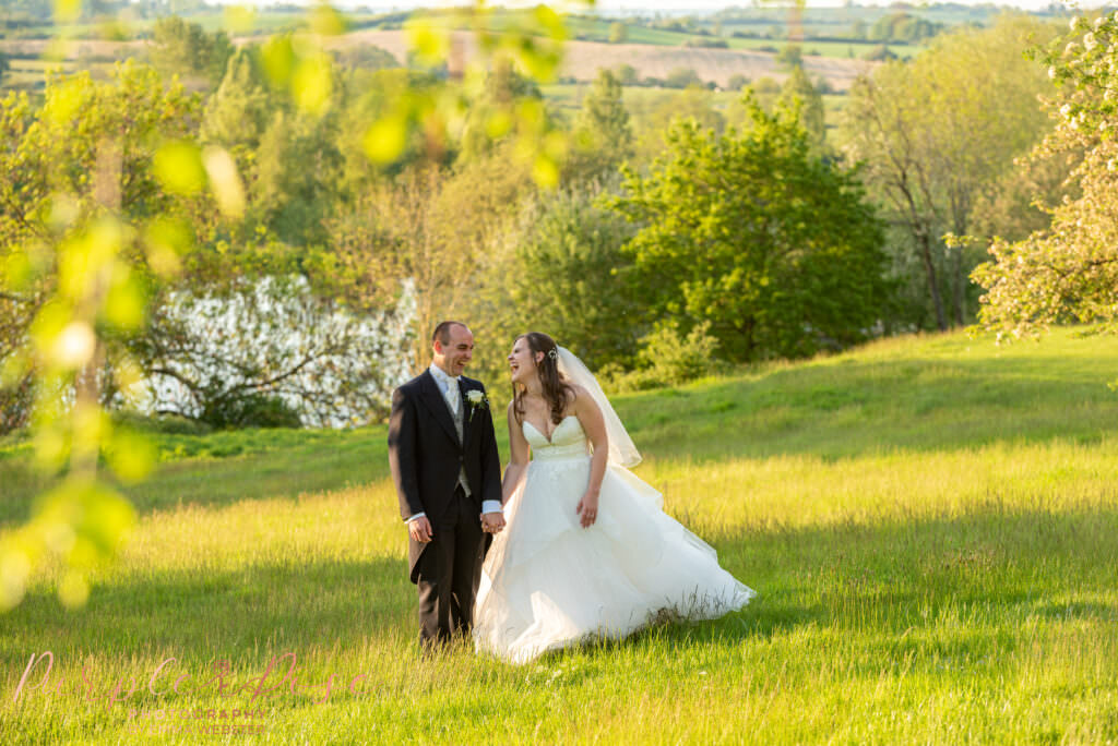 Bride and Groom walking hand in hand