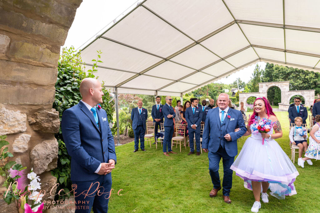 Groom seeing his bride for the 1st time on their wedding day