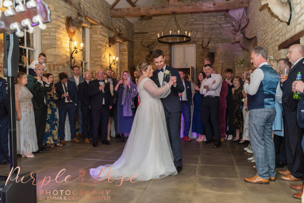 Photo of bride and groom enjoying their first dance on their wedding day in Milton Keynes
