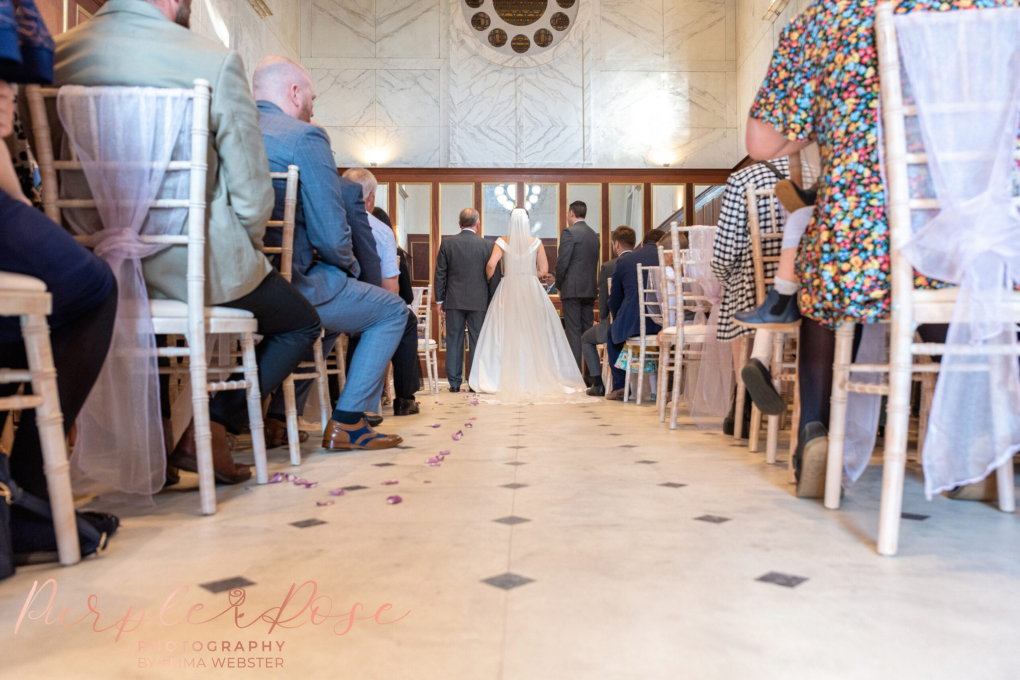 Bride and groom standing during their wedding ceremony