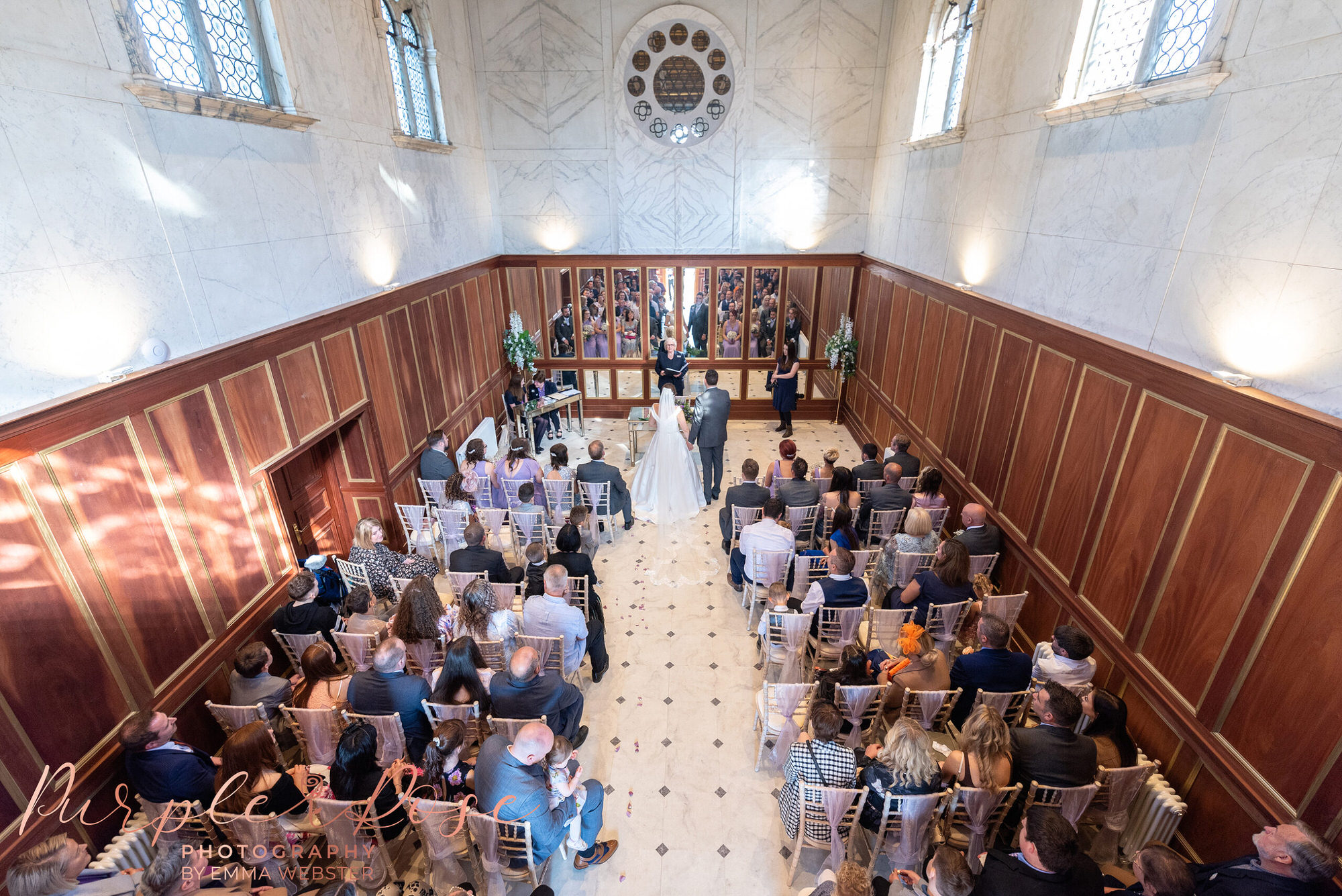 View of wedding ceremony from a balcony