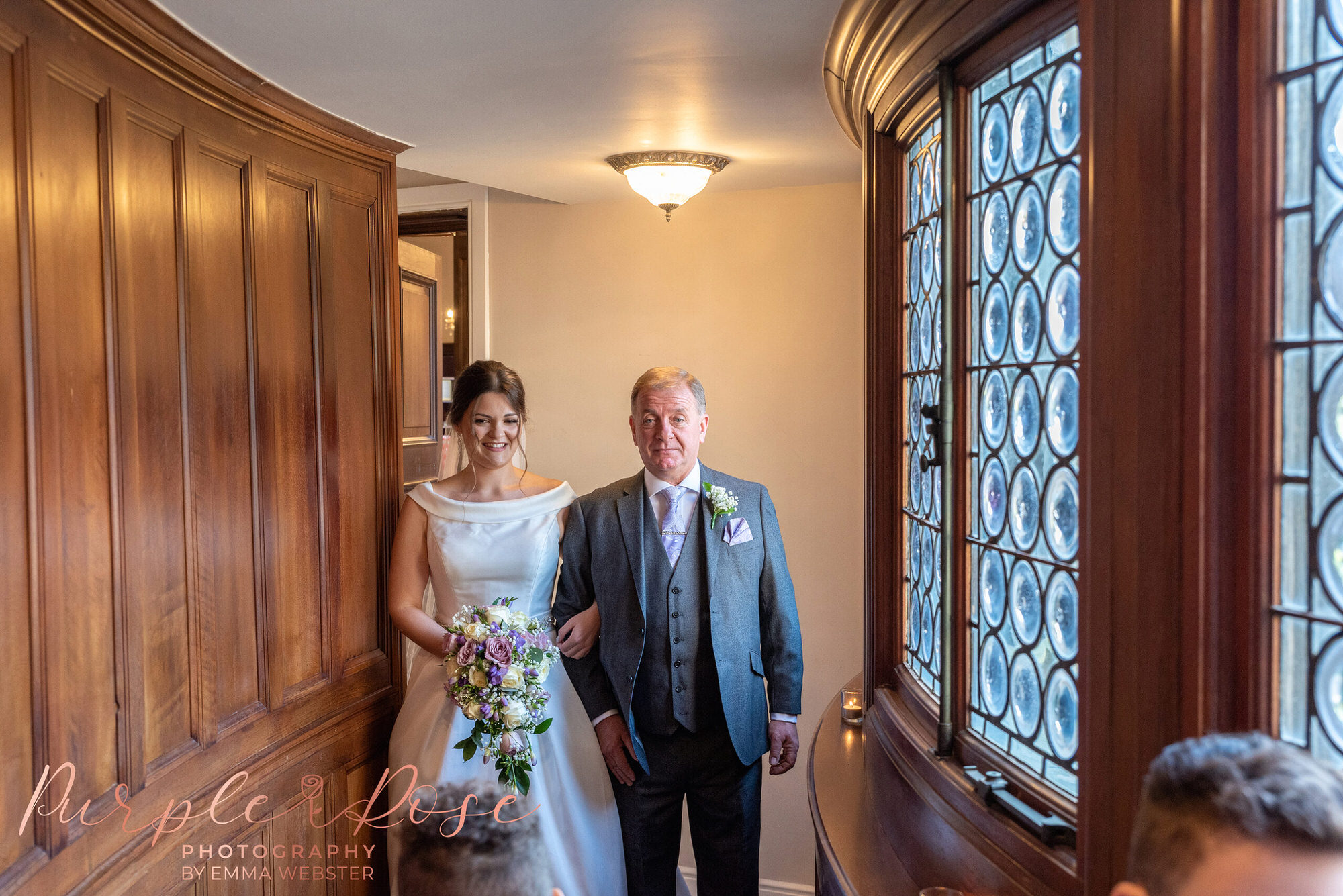 Bride and her father waiting to walk into the wedding ceremony