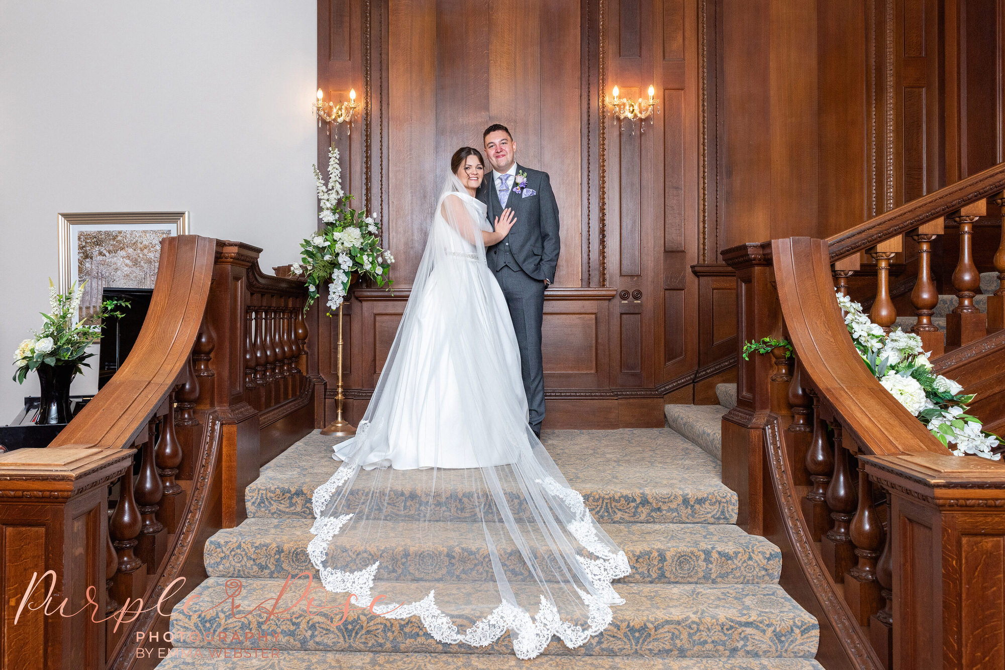 Bride and groom on staircase