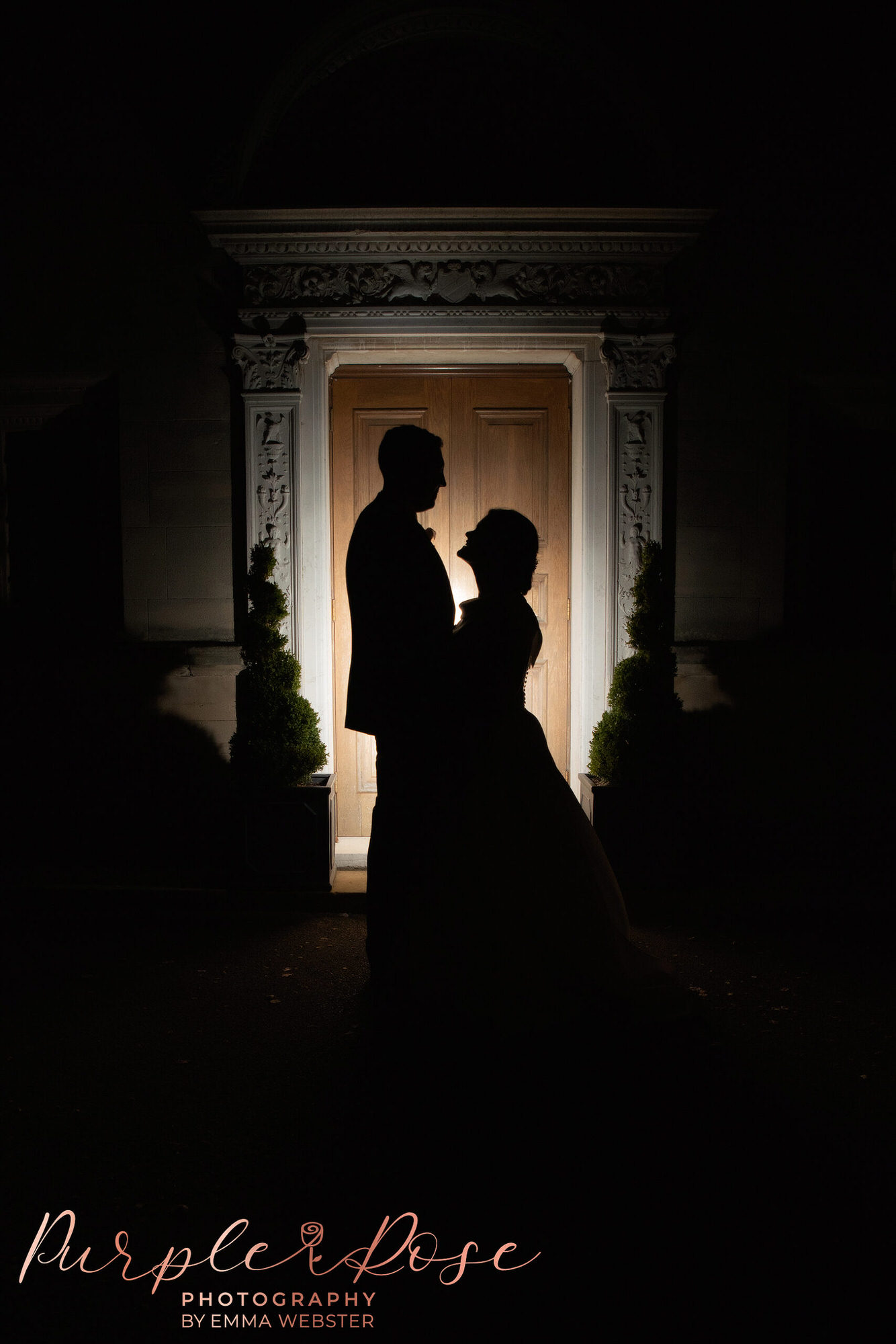 Silhouette of a bride and groom