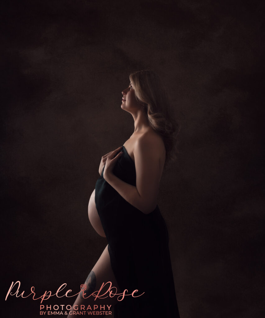 Side lit photo of mum to be at her maternity photoshoot in Milton Keynes