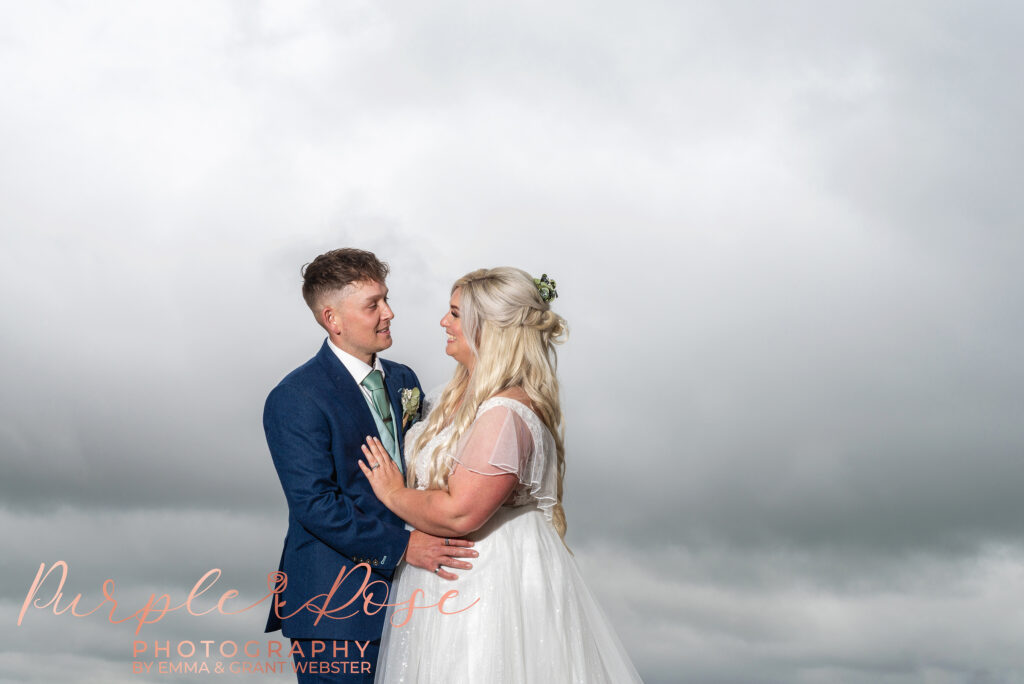 Photo of bride and groom looking into each others eyes on their wedidng day in Northampton