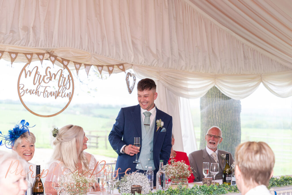 Photo of groom during his speech on their wedding day in Northampton