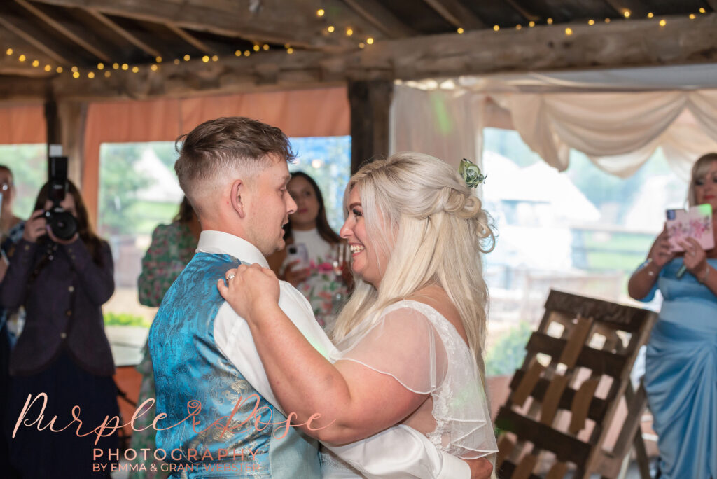 Photo of bride and groom danicng on their wedding dayin Northampton