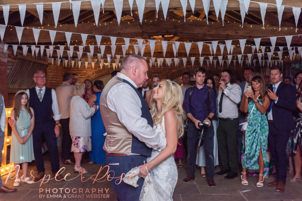 Photo of bride and groom during their first dance on their wedding day in Northampton