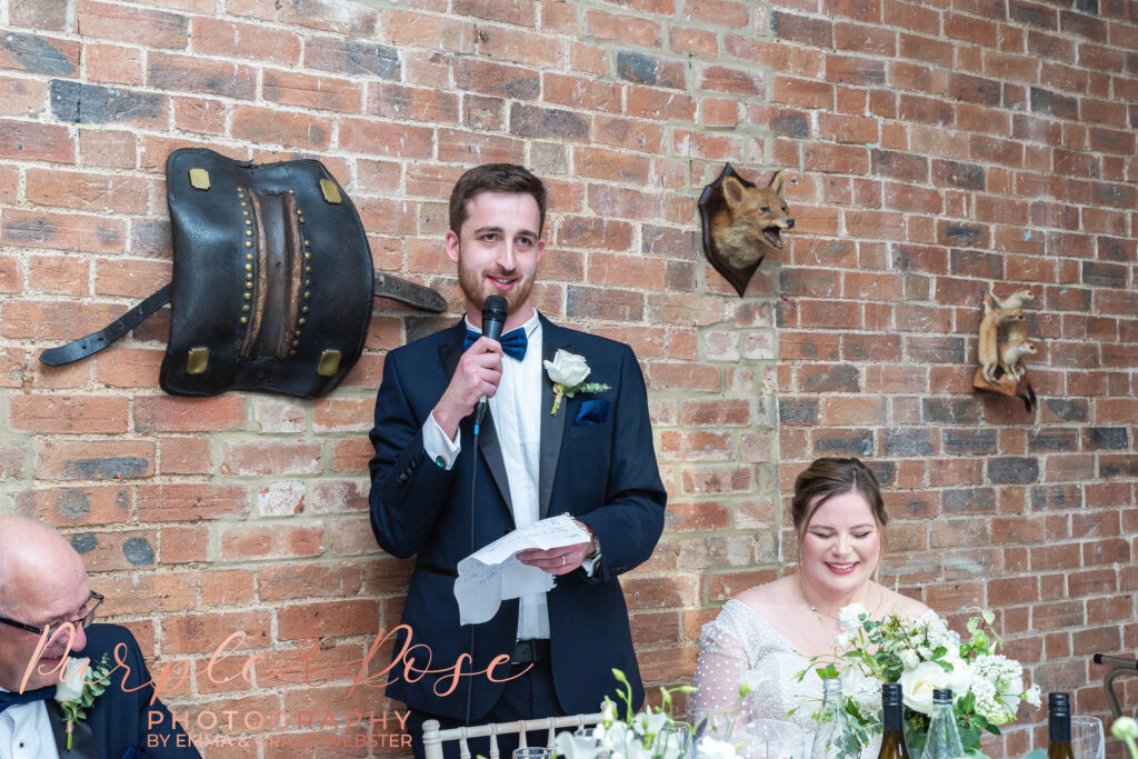 Photo of a groom giving his speach during his wedding in Milton Keynes